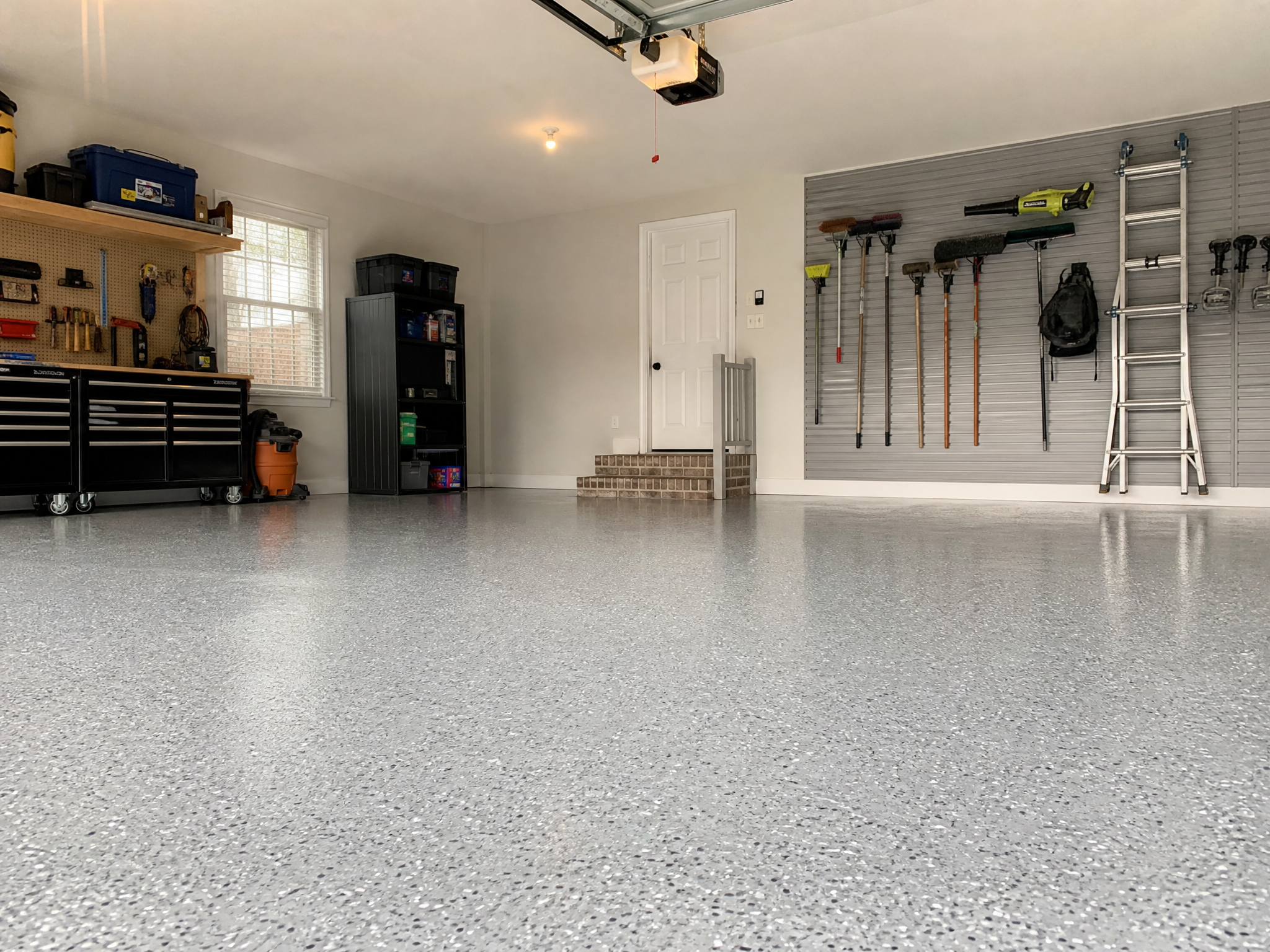 Completed shop, warehouse & industrial floor coatings showing professional quality workmanship in a American home