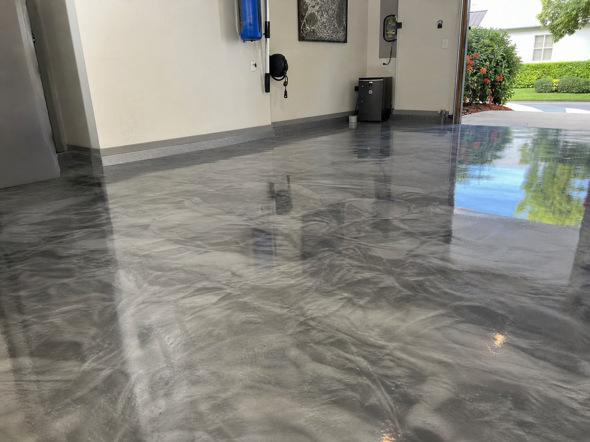 Completed metallic epoxy floors showing professional quality workmanship in a American home