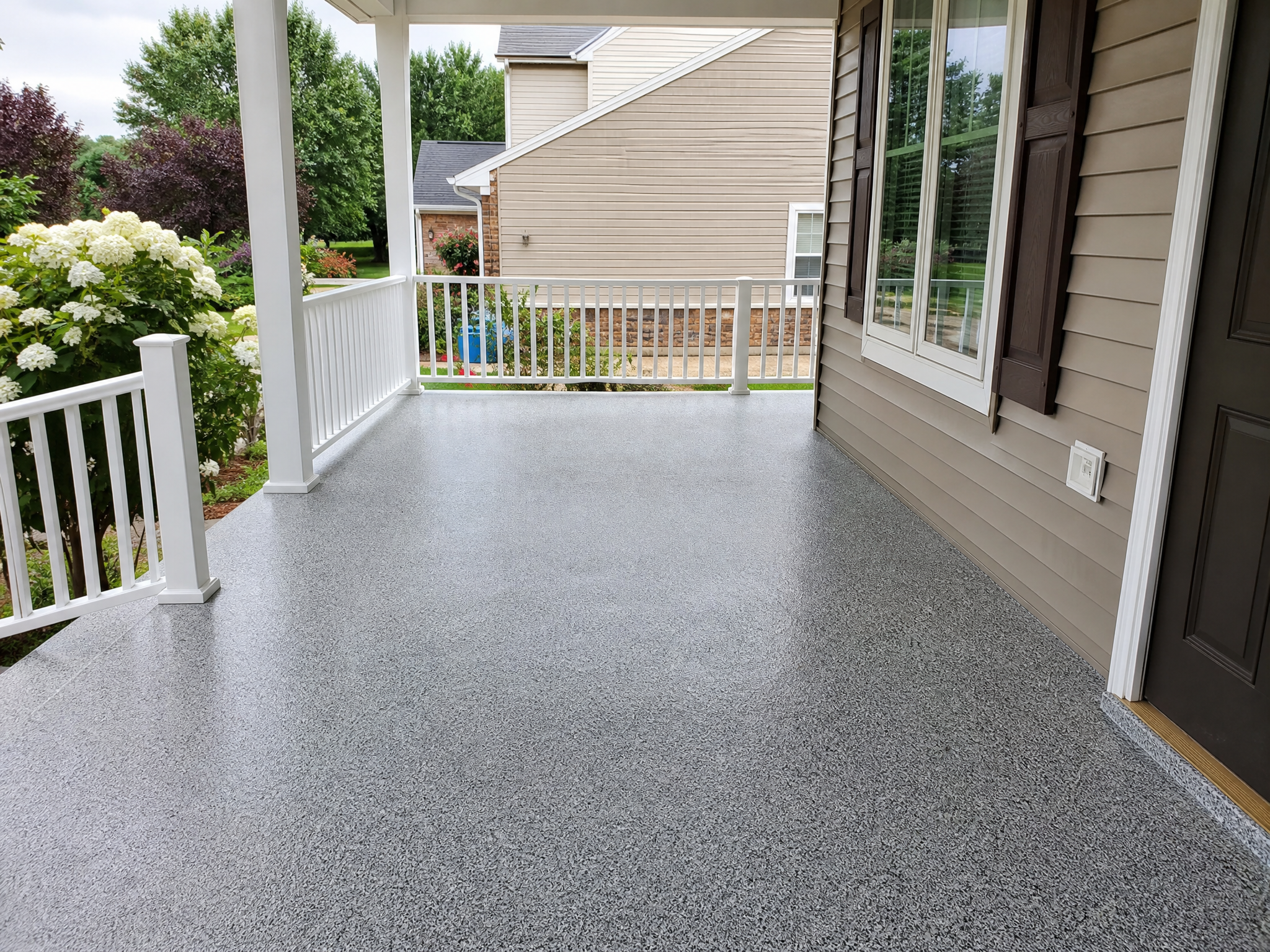 Completed patio & porch coatings showing professional quality workmanship in a American home