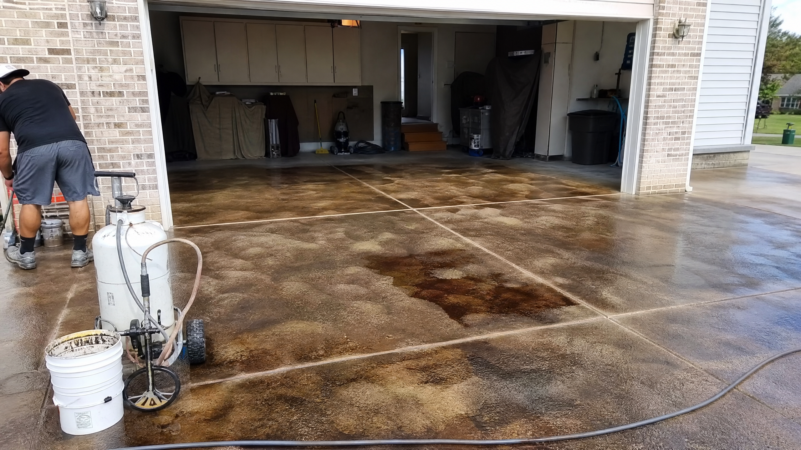 Stained Concrete Floors in progress at a American residential property — professional service in Sumter County, SC